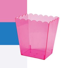 a pink vase with scalloped edges against a blue and pink background