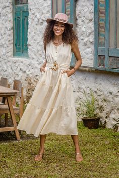 Balinese Beige Linen Tiered Dress with Round Neck - Flawless | NOVICA Summer Linen Tiered Dress, Tiered Linen Maxi Dress For Vacation, Tiered Linen Beach Dress, Sleeveless Cream Linen Midi Dress, Cream Linen Midi Dress For Day Out, Cream Linen Dress For Garden Party, Chic Linen Tiered Dresses, Linen Tiered Dresses For Vacation, Linen Tiered Vacation Dresses