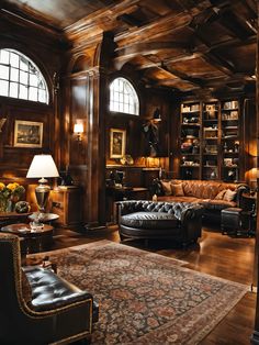 a living room filled with lots of furniture and bookshelves on top of wooden floors