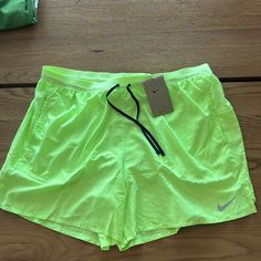 Volt (Neon Green) Color Green Nike Athletic Shorts For Sports, Nike Green Athletic Shorts For Running, Sporty Neon Bottoms For Sports, Green Nike Shorts For Running, Nike Green Athletic Shorts, Nike Green Athletic Sportswear Shorts, Nike Green Athletic Running Shorts, Green Nike Running Shorts, Nike Green Running Shorts