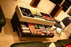 a coffee table with games on it in a living room