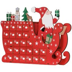 a wooden christmas calendar with santa claus and reindeers on the front, sitting in a sleigh