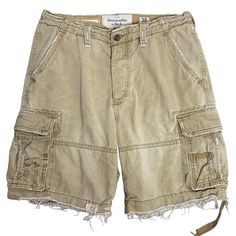 Vintage Y2K Abercrombie Cargo Shorts 32 Khaki Pockets Pockets Adjustable WaistGood conditionWear around the pockets and hemsWaist: 19" laying flatInseam: 10"Front rise: 12"100% CottonMade in Bangladesh Affordable Khaki Cargo Shorts, Cheap Khaki Cargo Shorts For Summer, Cheap Khaki Cargo Shorts With Hip Pockets, Cheap Beige Cotton Cargo Shorts, Cheap Khaki Cargo Shorts, Cheap Khaki Cargo Shorts For Spring, Affordable Medium Wash Cargo Shorts, Cheap Casual Beige Cargo Shorts, Cheap Beige Cargo Shorts With Side Pockets