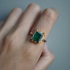 Read about our payment plans before proceeding.The Isis Emerald Scroll Diamond ring is an exquisite piece. Inspired by the details on architectural buildings in NYC, this ring features a stunning natural emerald framed by two baguette diamonds and round diamonds. Made for a true goddess with a touch of vintage vibe. Available in 14K solid yellow gold, white gold, and rose gold. 14K solid gold Natural 9*7mm emerald. Approx. 2.6ct. Comes with a certificate Natural baguette diamonds. Approx. 0.04ct Baguette Diamonds, Architectural Details, Gold Necklace Designs, Baguette Diamond, Natural Emerald, Conflict Free Diamonds, Necklace Designs, Vintage Charms, In The Heart