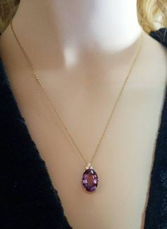 This is a beautiful pendant! 14K yellow gold amethyst and diamond pendant. It has a prominent purple amethyst stone below three elegant diamonds. The chain is 18-inches long. Oval Amethyst Pendant, Oval Stone Pendant, Quince Necklace, Clawdeen Costume, Pendant Bail, Amethyst Necklace Pendant, Casual Nails, Gold Chain With Pendant, Pendant Bails