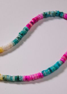 Sunset Multicolor Single Strand Rondelle Beaded Necklaces, Multicolor Rondelle Beaded Necklaces Single Strand, Multicolor Rondelle Beaded Necklace Single Strand, Multicolor Rondelle Single Strand Jewelry, Multicolor Single Strand Rondelle Jewelry, Heishi Beads Jewelry With Faceted Round Beads, Multicolor Hand-strung Rondelle Beaded Necklaces, Beach Jewelry With Polished Oval Beads, Adjustable Single Strand Rondelle Beaded Necklace