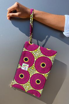 Colorful Ghanian wax print clutch wristlet to leave you hands-free while out-and-about. Holds all the essentials and more. Order it to match your backpack and duffel bag or as a stand-alone accessory. This is your new purse! Size 11” w x 7” h with 8” wrist strap Multicolor Phone Bag With Zipper For Daily Use, Trendy Wristlet With Mobile Phone Bag For Travel, Casual Wristlet With Removable Pouch For Travel, Trendy Mobile Phone Bag Wristlet For Travel, Trendy Travel Wristlet For Mobile Phone, Trendy Travel Wristlet With Mobile Phone Bag, Casual Travel Wristlet With Removable Pouch, Everyday Multicolor Rectangular Phone Bag, Multicolor Handheld Travel Pouch