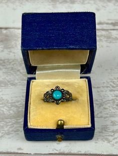 Vintage BELL TRADING POST Sterling Silver & Turquoise Pinky Ring Southwestern Boho Style 925. Here we have a fabulous little turquoise and silver ring by Bell Trading Post. The ring is crafted in sterling and centers around the solitaire turquoise cabochon in a sawtooth bezel setting and framed with a North Star motif. The band splits at the shoulders and is engraved with scalloped southwestern style motifs and completes with a simple shank underneath. The ring is hallmarked with the Bell Trading Post logo as well as STERLING at the shank's base. The ring is in good vintage condition with no issues to note and a darkened patina which can be polished if desired. The ring can be resized slightly, please inquire within prior to purchase if you need a quote to resize.  Measurements in inches: Antique Turquoise Sterling Silver Ring, Bohemian Hallmarked Turquoise Ring, Western Style Turquoise Ring Stamped 925, Antique Stamped 925 Turquoise Ring As A Gift, Western Style Gemstone Ring Gift, Western Style Gemstone Ring As Gift, Western Style Stamped 925 Rings As Gift, Western Style Gemstone Rings For Gifts, Western Style 925 Silver Rings As Gifts