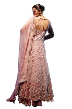 Peach pink attached cancan lehenga with small motifs and scallop embroidered border. Paired with a kalidaar jacket with peal, garnet and bead work and dupatta featuring embellishment on one elongated side and scallop detailing on the rest. - Aza Fashions Pink Anarkali Salwar Kameez Hand Embellished, Anarkali Hand Embellished Pink Salwar Kameez, Pink Hand Embellished Floor-length Anarkali Set, Pink Fitted Gown For Designer Wear, Pink Fitted Designer Gown, Semi-stitched Hand Embellished Pink Dress, Fitted Pink Anarkali Set Hand Embellished, Traditional Pink Hand Embellished Salwar Kameez, Pink Hand Embellished Anarkali Set For Wedding