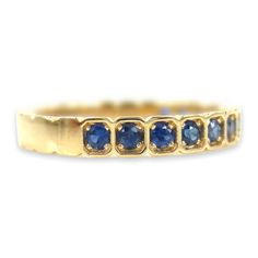 MADE TO ORDER (Only Ring size 6.25 Yellow gold available for immediate shipping). This magnificent Half-set Square-cut bezel box featuring prong-set round blue Sapphires crafted in 18k yellow gold. A stunning band on its own or stacked with another ring or bands. Based on Ring Size: 6.25 *Design: Half-set Band *Material: 18K Yellow Gold *Stones: Natural Blue Sapphires *Count: 13 PCS *Weight: 0.43cts T.W *Band Width: 2.8mm (with +/- 0.1mm variation) Stone weight varies depending on your requested Rectangular Sapphire Anniversary Ring, Classic Rectangular Sapphire Ring, Formal Stackable Sapphire Ring, Classic Stackable Sapphire Diamond Ring, Classic Sapphire Stackable Jewelry, Yellow Gold Stackable Sapphire Ring, Classic Stackable Sapphire Jewelry, Heirloom Stackable Yellow Gold Sapphire Ring, Formal Stackable Round Cut Sapphire Ring