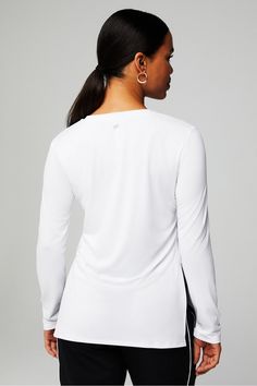 Dry-Flex Long-Sleeve Tunic Fabletics white female Activewear >> Womens >> Tops >> Long-Sleeves >> Long-Sleeve Top regular Running/Training Moisture-Wicking White Stretch Activewear For Fall, Versatile White Top With Thumbholes, White Long Sleeve Activewear With Thumbholes, White Relaxed Fit Long Sleeve Activewear, Moisture-wicking Long Sleeve Gym Tops, Cheap Moisture-wicking Long Sleeve Activewear, Stretch Long Sleeve T-shirt For Running, Moisture-wicking Long Sleeve Yoga Tops, Moisture-wicking Long Sleeve Training T-shirt