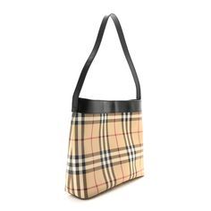 This is an authentic BURBERRY Vintage Check Shoulder Bag in Black. This stylish tote is crafted of beige Burberry check coated canvas. The shoulder bag features black trim, a black leather shoulder strap, and silver hardware. The top opens to a black fabric interior with a zipper pocket. Burberry Vintage, Check Coat, Reversible Tote, Burberry London, Shoulder Bag Black, Blue Ink, Print Tote, Black Trim, Silver Hardware