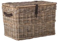 a large wicker basket with leather handles on an isolated white background for use as a storage container