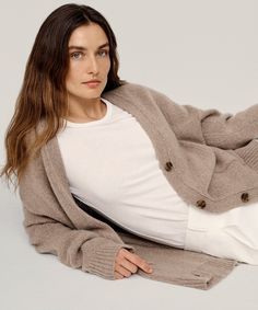 Cashmere Spencer Cardigan Almond With a plush feel and easy, boyfriend-inspired fit, this 100% cashmere cardigan features a jersey stitch and classic pockets to deliver a borrowed-from-the-boys look. Pair this knit with the Demi Pant or Velvet Stella Dress for a cozy layer, or don it as our version of a California coat. | Jenni Kayne Women's Cashmere Spencer Cardigan Sweater Size X-Large Relaxed Fit Cashmere Cardigan For Layering, Classic Everyday Cashmere Cardigan, Relaxed Fit Cashmere Cardigan For Fall, Everyday Relaxed Fit Cashmere Cardigan, Classic Cashmere Cardigan, Classic Soft Knit Cashmere Cardigan, Relaxed Fit Cashmere Cardigan With Ribbed Cuffs, Relaxed Fit Cashmere Outerwear, Everyday Cashmere Outerwear With Ribbed Cuffs