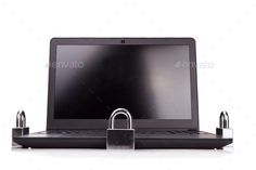 an open laptop computer with a padlock on the keyboard - stock photo - images