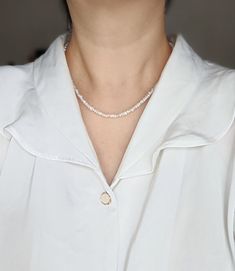 This Freshwater keshi seed pearl necklace, Layering pearl necklace, Tiny pearl necklace, Pearl necklace, Pearl choker, Chain pearl necklace looks so chic and modern. It is made with tiny freshwater keshi pearls (3.5-4mm) and 14k gold paperclip chain. The closure is a lobster claw closure. The length is 16.5 inches, so it sits right on your collar bones. It can be worn alone (see picture 6) or as a layering necklace (see picture 7). The original design does not include an extension chain, however Minimalist White Chain Choker Necklace, Minimalist White Choker Chain Necklace, White Pearl Choker Chain Necklace, Dainty Pearl White Beaded Necklaces With Pearl Chain, White Minimalist Single Strand Chain Necklace, White Chain Necklace With Pearl Pendant And Round Beads, Dainty Baroque Pearl Necklace In Pearl White, Minimalist White Single Strand Chain Necklace, Minimalist White Beaded Pearl Necklace