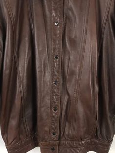 "-Description- >men's genuine brown leather coat >snap button front >lined >two open pockets on the front >collared >size small >classic! >condition: great - some distress from wear >color(s): brown >fabric(s): 100 leather >brand: none -Measurements- >size: small ✩ all measurements are taken with the item laying flat & some sizes are estimates so please check measurements ✩ chest:48 \" / 122cm length: 29\" / 74cm -social media- instagram: @voguevibesvintag Brown Collared Leather Jacket For Business, Brown Collared Leather Jacket With Snap Buttons, Brown Business Outerwear With Buttons, Brown Single Breasted Leather Jacket With Collar, Brown Leather Jacket With Button Closure For Work, Brown Collared Leather Jacket With Buttons, Brown Single Breasted Collared Leather Jacket, Brown Single-breasted Collared Leather Jacket, Brown Leather Button-up Outerwear