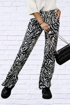 Unleash your wild side with our Full Size Animal Print Elastic Waist Pants. These pants offer a comfortable fit with an elastic waistband and a playful, eye-catching print. Perfect for adding a touch of fun to your wardrobe. Material composition: 100% Polyester Care instructions: Machine wash cold. Tumble dry low. Imported Size US Bottom Length Waist Hip S 2/4 39 25.2 0 M 6 39.4 26.8 0 L 8 39.8 28.3 0 XL 10 40.2 29.9 0 2XL 12 40.6 31.5 0 3XL 14 40.9 33.1 0 Kimono Sweater, Elastic Waist Pants, Dress Pant, Waist Pants, Cardigan Coat, Dress Accessories, Sweater Cardigan, Animal Print, Care Instructions