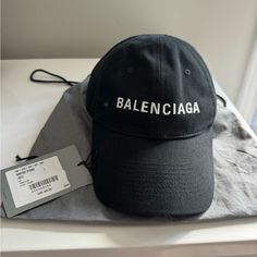 Black Balenciaga Hat Brand New Never Worn. Have Dust Bag And Receipt. Black And White Jumpsuit With Black Speed Balenciaga, Balenciaga Kids Backpack, Balenciaga Face Mask, Luxury Black Hat For Spring, Designer Black Spring Hats, Designer Black Hats For Spring, Designer Black Summer Hats, Balenciaga Hat, Black Balenciaga