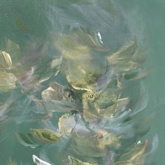 an image of fish in the water with leaves on it's back and sides