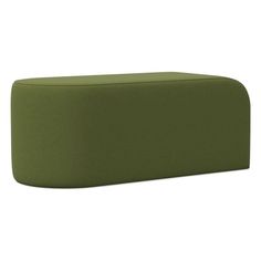 a green couch sitting on top of a white floor