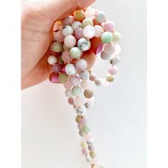 This dreamy mala necklace is filled with airy pastel colors and beautiful light energy. This 108 mala necklace is composed of Amazonite, Rose Quartz, Kunzite, Howlite and a Rainbow Moonstone Guru Crystal. Strung on a pink silk cord with Rose Gold Accents giving it a touch of tenderness and ooze with feminine energy. All Malas are saged to cleanse the energy before they are shipped to their new home. G E M S T O N E P R O P E R T I E S ♥ KUNZITE is a powerful healer of the emotional body, particu Spiritual Pink Beaded Necklaces With Natural Stones, Pink Spiritual Hand Wrapped Necklaces, Hand Wrapped Pink Spiritual Necklaces, Pink Spiritual Hand Wrapped Necklace, Spiritual Pink Hand Wrapped Necklaces, Spiritual Pink Hand Wrapped Necklace, Spiritual Pink Crystal Necklaces With Round Beads, Pink Natural Stones Beaded Necklace For Healing, Bohemian Pink Beaded Necklace For Meditation