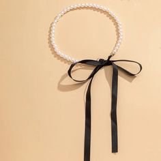 Trend Jewelry Long Black Ribbon Choker Necklace – lastrafashion Black Ribbon Choker Necklace, Black Ribbon Choker, Necklace Popular, Neck Necklace, Ribbon Choker Necklace, Bow Choker, Ribbon Choker, Necklace Chain Types, Pearl Beach