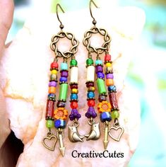 Rustic Boho Rainbow Beaded Earring Dangles, Multi Color Czech Glass Beads, Antiqued Brass Birds, Hearts & Arrows, Cute Bohemian Hippie Chic - Etsy Bohemian Multicolor Czech Glass Beaded Earrings, Bohemian Multicolor Beaded Earrings In Czech Glass, Multicolor Dangling Beaded Brass Earrings, Bohemian Multicolor Czech Glass Earrings, Multicolor Beaded Brass Earrings, Multicolor Brass Beaded Earrings For Festival, Bohemian Czech Glass Jewelry With Heart Beads, Bohemian Beaded Earrings With Heart Beads For Gift, Colorful Bohemian Jewelry With Heart Beads