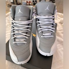 Like New In Box Worn Once. Jordan Retro 12 Stealth Size 7y. Women’s Size 8.5. Comes In Original Box Expensive Stuff To Buy, Hype Shoes Women, Retro 12 Jordans, Cool Shoes For Boys, Shoes That Go With Everything, Grey Jordan 4, Gray Jordans, Jordans 11, Snickers Shoes