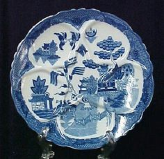 a blue and white plate with pictures on it