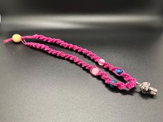 Handmade Usa Item * HEMP COLOR: pink *  Type: Necklace SPIRAL 18 inches long  * Materials: Smooth Blue Tiger Eye Stone, Natural Pink Quartz Stone, Black Veined Rhodonite Mushroom, Pink rope * Jewelry Style: Boho & hippie FAST SHIPPING  ✉️ 🇺🇸 Macramé hemp jewelry is a unique and stylish accessory that combines the art of macrame knotting with the natural beauty of hemp fibers. Handcrafted with care and attention to detail, each piece of macramé hemp jewelry is a work of art that adds a bohemian and earthy touch to any outfit. The use of hemp fibers in macramé jewelry not only adds a rustic and organic feel but also makes it an eco-friendly choice. Hemp is a sustainable and renewable material that requires minimal water and pesticides to grow, making it an environmentally conscious option Adjustable Pink Jewelry For Festivals, Handmade Adjustable Pink Necklace, Handmade Pink Necklaces For The Beach, Pink Beaded Crystal Necklace With Adjustable Fit, Adjustable Pink Beaded Crystal Necklace, Adjustable Pink Crystal Beaded Necklaces, Handmade Amulet Crystal Necklace For Festivals, Handmade Adjustable Necklaces For Meditation, Pink Spiritual Pendant Crystal Necklace