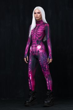 a woman with white hair wearing a purple skeleton suit