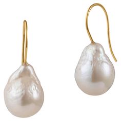 Our Baroque Drop Pearl Earrings are a best seller in our collection. This pair of earrings features baroque, drop shape pearls and a slim 18K Yellow Gold hook design that slips on to the ear. They are easy to slip on and comfortable to wear all day long without being too heavy. The long hook at the back ensures that they stay safely on the ear. We hand pick every pair of pearls we use and ensure that the lustre is excellent. Due to the organic nature of the pearls every pair we create is unique Drop Pearl Earrings, Gold Baroque, Baroque Pearl Earrings, Pearl And Diamond Earrings, Vintage Pearls, Diamond Drop Earrings, Stunning Earrings, Modern Earrings, Gold Drop Earrings