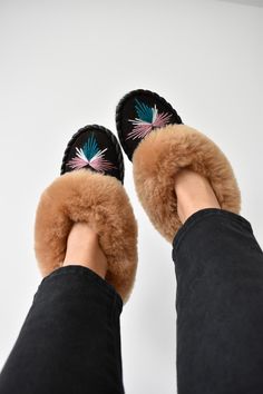 Beautiful, unique, traditional, 100% handmade sheepskin moccasins slippers are made from natural leather and sheep wool. Small leather pieces and sheepskin leftovers are turned into beautiful and one of a kind home shoes. Our slippers are very soft and comfortable. Perfect on rheumatic pain and are hypoallergenic. Outer: sheepskin; Sole: harden suede leather ( will soften after 2-3 days) Insole: wool lining Please note - because of handmade nature of this slippers colour shade, or thread might differ a liitle bit. Sheepskin Slippers With Rubber Sole And Round Toe, Sheepskin Slippers With Leather Sole And Round Toe, Sheepskin Slip-on Slippers For Fall, Winter Sheepskin Slippers With Rubber Sole, Winter Leather Moccasins With Rubber Sole, Brown Sheepskin Slippers With Leather Sole, Shearling Slippers With Rubber Sole And Closed Toe, Winter Sheepskin Moccasins With Round Toe, Brown Slip-on Moccasins For Winter