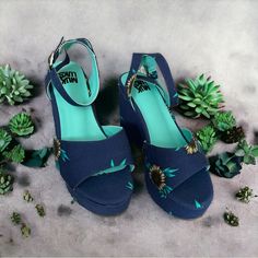 Casual Wedge Sandals With Floral Print, Summer Floral Print Wedge Sandals, Blue Platform Sandals For Summer, Blue Summer Style Wedge Sandals, Blue Wedge Sandals For Summer Vacation, Blue Summer Platform Wedge Sandals, Blue Summer Wedge Sandals For Beach, Blue High Heel Wedge Sandals For Vacation, Summer Blue Heels With Round Toe