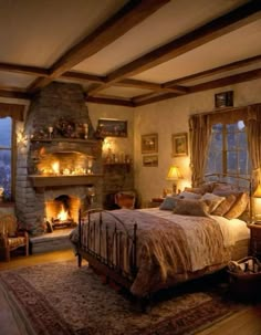 a bedroom with a fireplace and bed in it