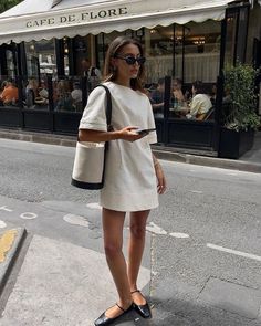 Minimalist white dress mini, black ballet flats, pouch bag | Summer outfits European Outfits September, Outfits With Black Flats, Spring Shoes 2024, Flats Outfit Summer, Mary Jane Flats Outfit, Seoul Summer, Mary Jane Outfit, Mary Janes Outfit, Mary Jane Shoes Outfit