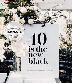 a sign that says 10 is the new black with white flowers in front of it