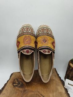 This is handmade genuine leather women's sandals.  Made with natural leather interior lining and leather sole.  Every size available.  There is ethnic kilim pattern on it.  On our page you can see other colours.  Hand stitched sole.  Door to door express shipping.  For wholesale and other questions please contact with us.  bemyboots.etsy.com Thank You Bohemian Closed Toe Flats For Festivals, Bohemian Sandals With Round Toe And Leather Sole, Bohemian Leather Flats With Closed Toe, Artisan Brown Slip-on Moccasins, Bohemian Leather Slip-on Flats, Bohemian Leather Closed Toe Flats, Bohemian Style Leather Slip-on Flats, Bohemian Beige Slip-on Sandals, Bohemian Flat Sandals With Rubber Sole