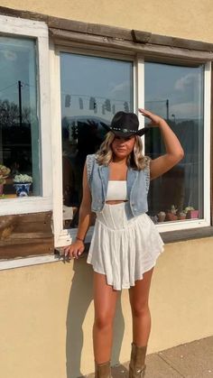 Costal cowgirl, summer dress, white summer dresses, white dress, graduation dress, summer outfits, festival outfit, country concert outfit, country outfit, cowgirl style, western style, instagram pictures, style inspiration, denim vest, styling vests, summer style trends Summer Outfits Festival, Vest Styling, Concert Outfit Country, White Romper Dress, Outfit Country Concert, Traje Cowgirl, Country Festival Outfit, Stagecoach Outfit, White Summer Dresses