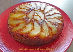 a pineapple upside down cake on a red plate