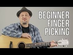 a man holding a guitar with the words jeff buckley haleluah on it