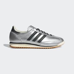 First released in 1972, the adidas SL 72 shoes featured a lightweight build that revolutionized running. This pair keeps the same slender silhouette and low-profile cut and adds a high-shine metallic finish to the leather upper. An EVA midsole keep you comfortable on your feet no matter where the day takes you. Women Adidas Shoes, Silver Adidas, Eras Outfit, Adidas Sl 72, Silver Sneakers, Shoes Silver, Metallic Sneakers, Adidas Shoes Women, Adidas Shop