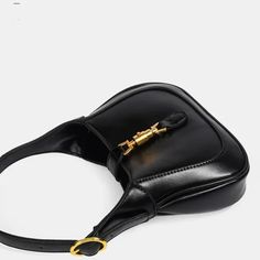 Black Classic Curved Leather Handbag with Signature Buckle Closure Leather Making, Classic Handbags, Shoulder Messenger Bag, Metal Buckles, Leather Handbag, Timeless Classic, Leather Handbags, Vegan Leather, Buckle