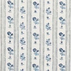 a blue and white striped wallpaper with flowers