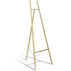 a gold metal easel stands on a white background with the shadow of an object