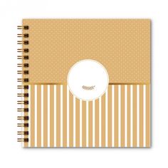 a spiral notebook with stripes and dots on it