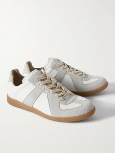 Find MAISON MARGIELA Replica Leather And Suede Sneakers Eu 39 on Editorialist. Maison Margiela's 'Replica' sneakers are modelled after Austrian running shoes from the '70s. Made from a combination of white leather and light-grey suede, this pair has gripped rubber soles and internal straps so they fit securely. Shoe Rotation, Luxury Sneakers, Hype Shoes, Casual Accessories, Sneakers Outfit