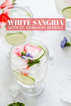 white sangria with strawberry, cucumber and mint garnish in glasses