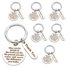 six keychains with different sayings on them, including one that says thank you